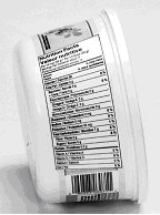 Margarine container with tapered Nutrition Facts table. The on its side NFT narrows towards the bottom of the container to follow its shape. This is not permitted.