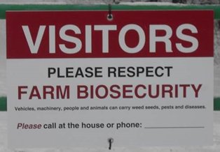 A photo of a square biosecurity sign on a gate. Description follows.
